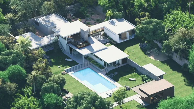 Aerial view of a flat-roofed courtyard villa with a long pool, set in dense trees