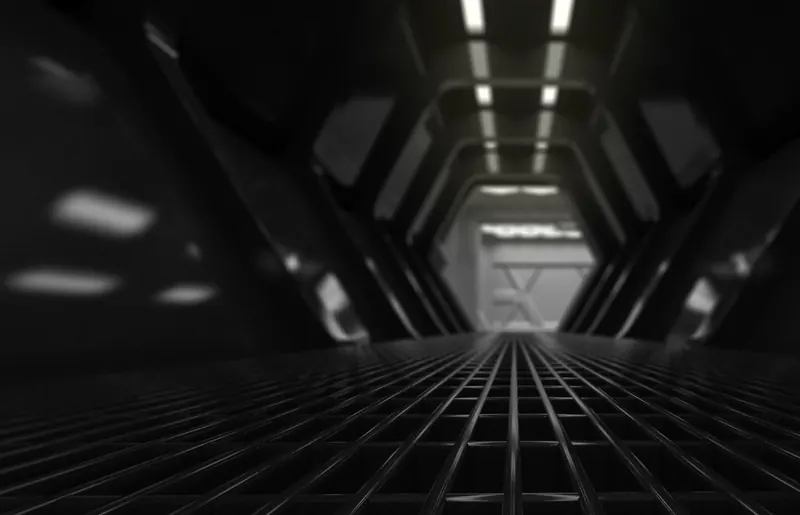 A dark laboratory corridor with a steel grille floor and strip lights