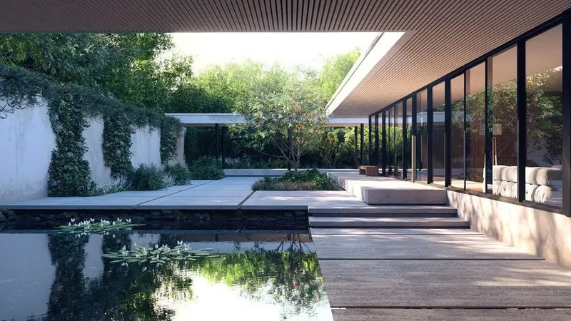A courtyard under a deep timber soffit, with full-height glazing and a still pool of water lilies